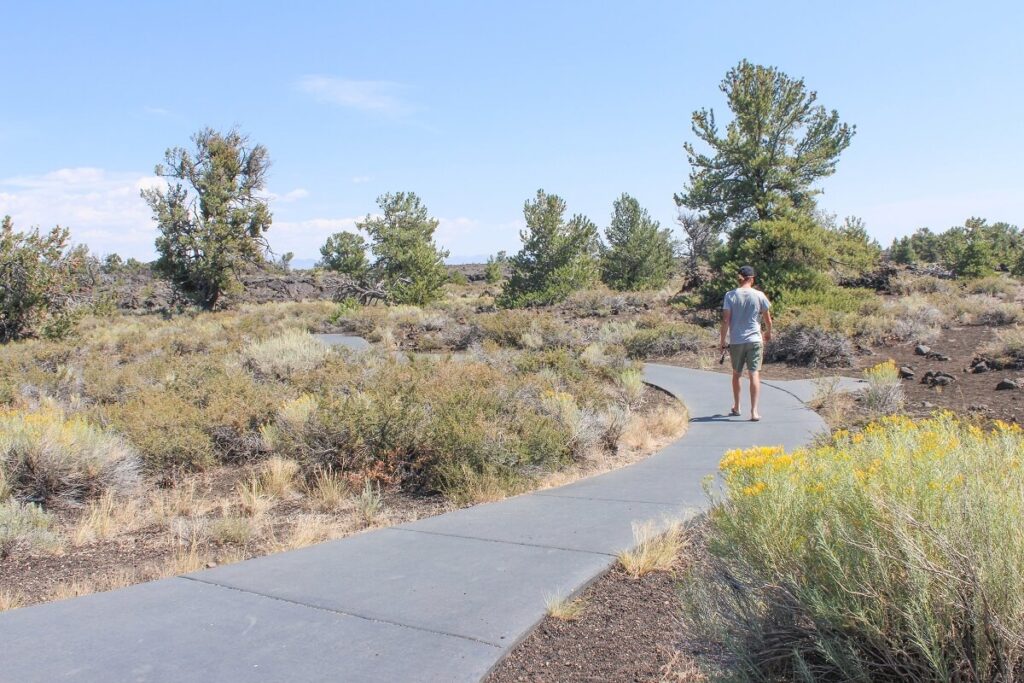 Hiking Devils Orchard Nature Trail at Craters of the Moon National Monument in Idaho.