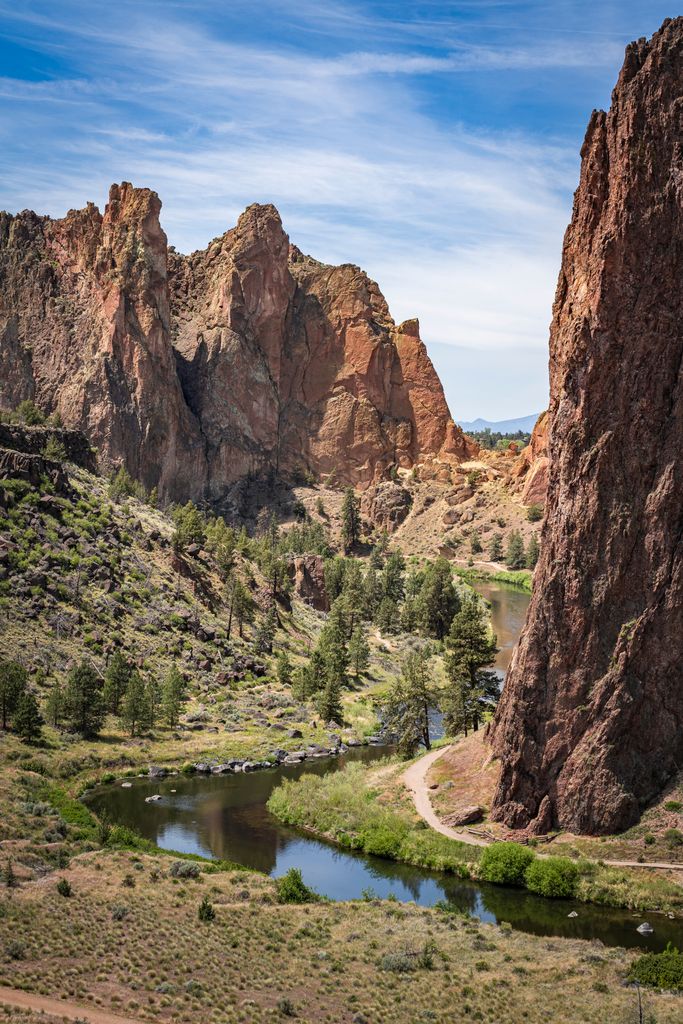Towering cliffs and a winding river through Smith Rock State Park in Oregon.